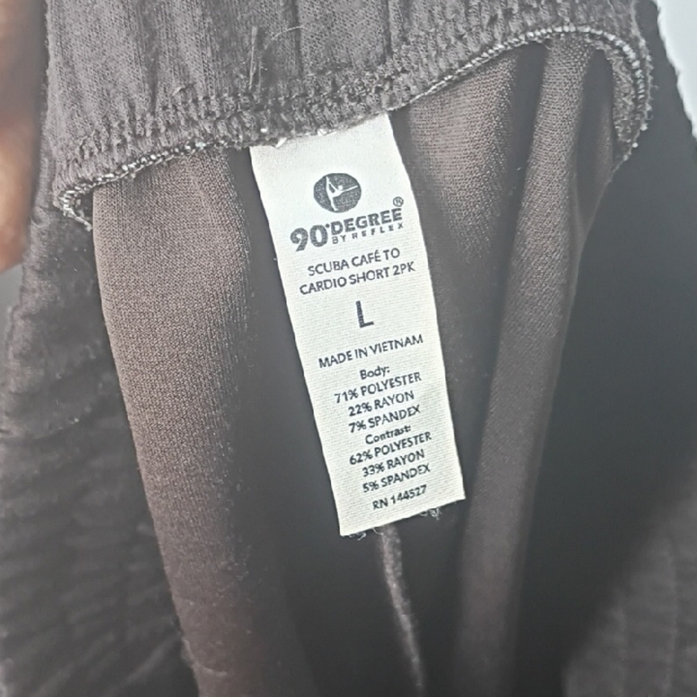 Mixed Stack of Folded Pants and Jeans - White, Purple, Light Blue, Black - Picture 10 of 14